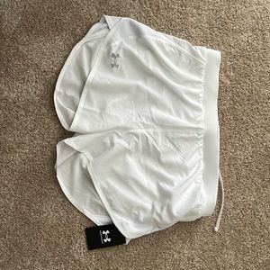 Under Armour size medium white women’s shorts. NWT